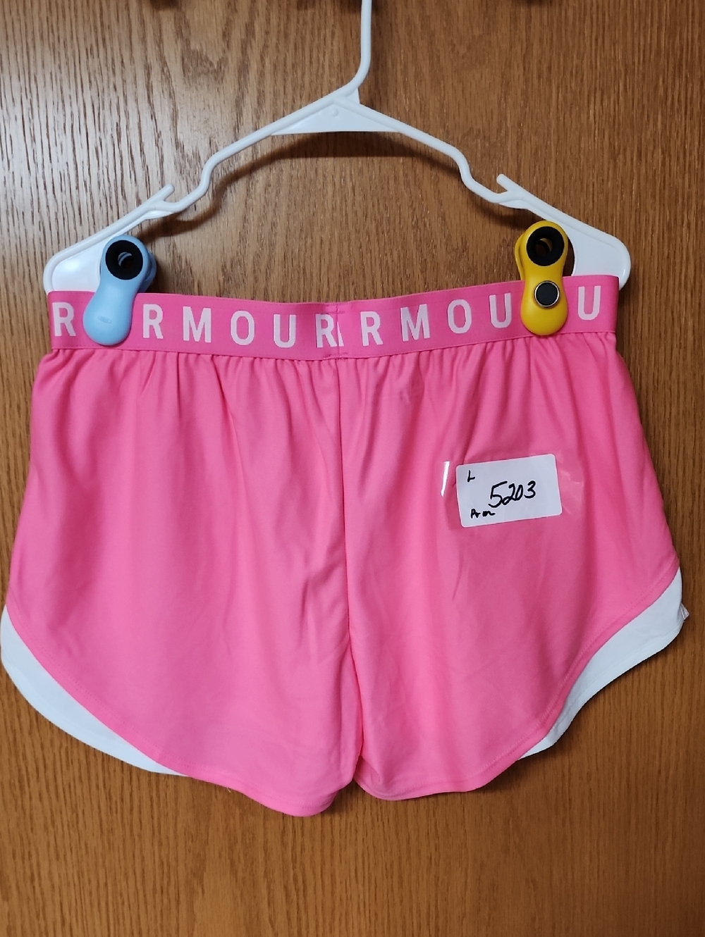 Under Armour Women's Pink Athletic Shorts w pockets L number 5203